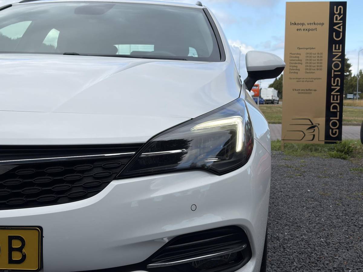 Opel Astra Opel Astra Sports Tourer 1.2 Edition ✓Camera ✓110pk✓2e Eigenaar✓Carplay✓Navi✓Airco✓Cruise✓Pdc✓LED koplampen✓N.A.P.✓6 Bak✓Pdc V+A✓Lm velgen✓Dakdragers ✓Comfortstoelen✓Bj 11-2020✓Apk tot 07-2028