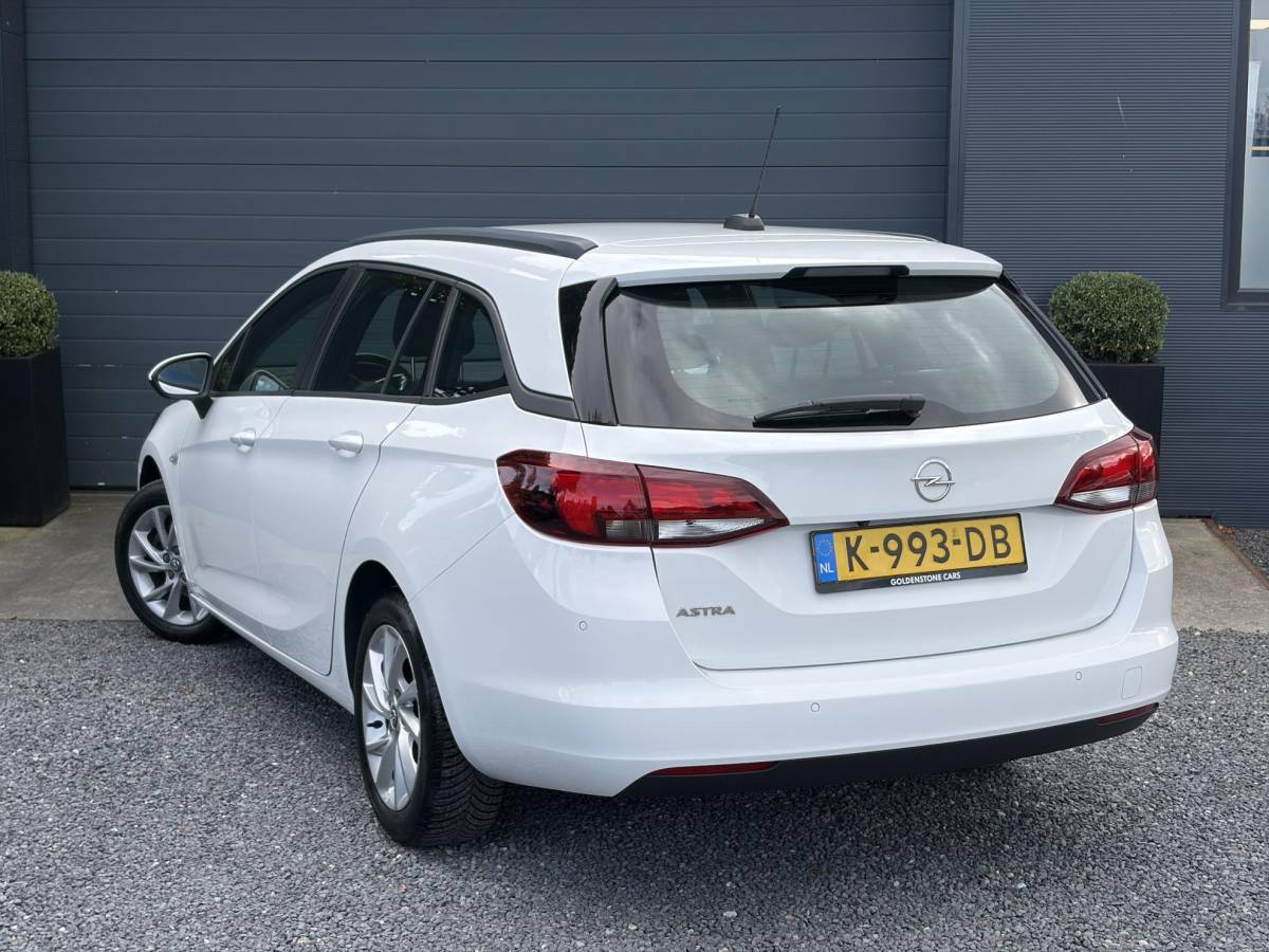 Opel Astra Opel Astra Sports Tourer 1.2 Edition ✓Camera ✓110pk✓2e Eigenaar✓Carplay✓Navi✓Airco✓Cruise✓Pdc✓LED koplampen✓N.A.P.✓6 Bak✓Pdc V+A✓Lm velgen✓Dakdragers ✓Comfortstoelen✓Bj 11-2020✓Apk tot 07-2028