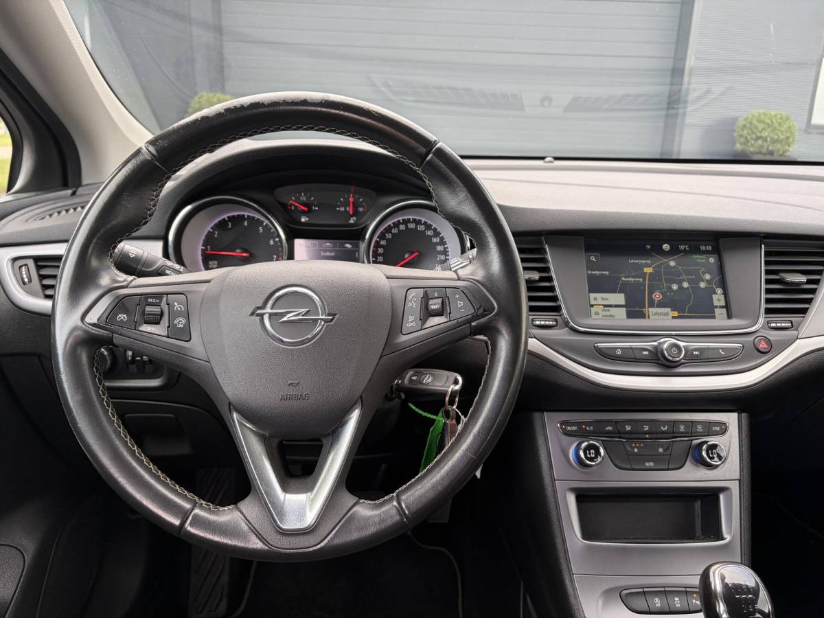 Opel Astra Opel Astra Sports Tourer 1.2 Edition ✓131pk✓2e Eigenaar✓Trekhaak✓Navi✓Airco✓Cruise✓Pdc V+A✓Lm velgen✓Dealer Onderhouden✓Comfortstoelen✓N.A.P✓Apk tot 07-2028
