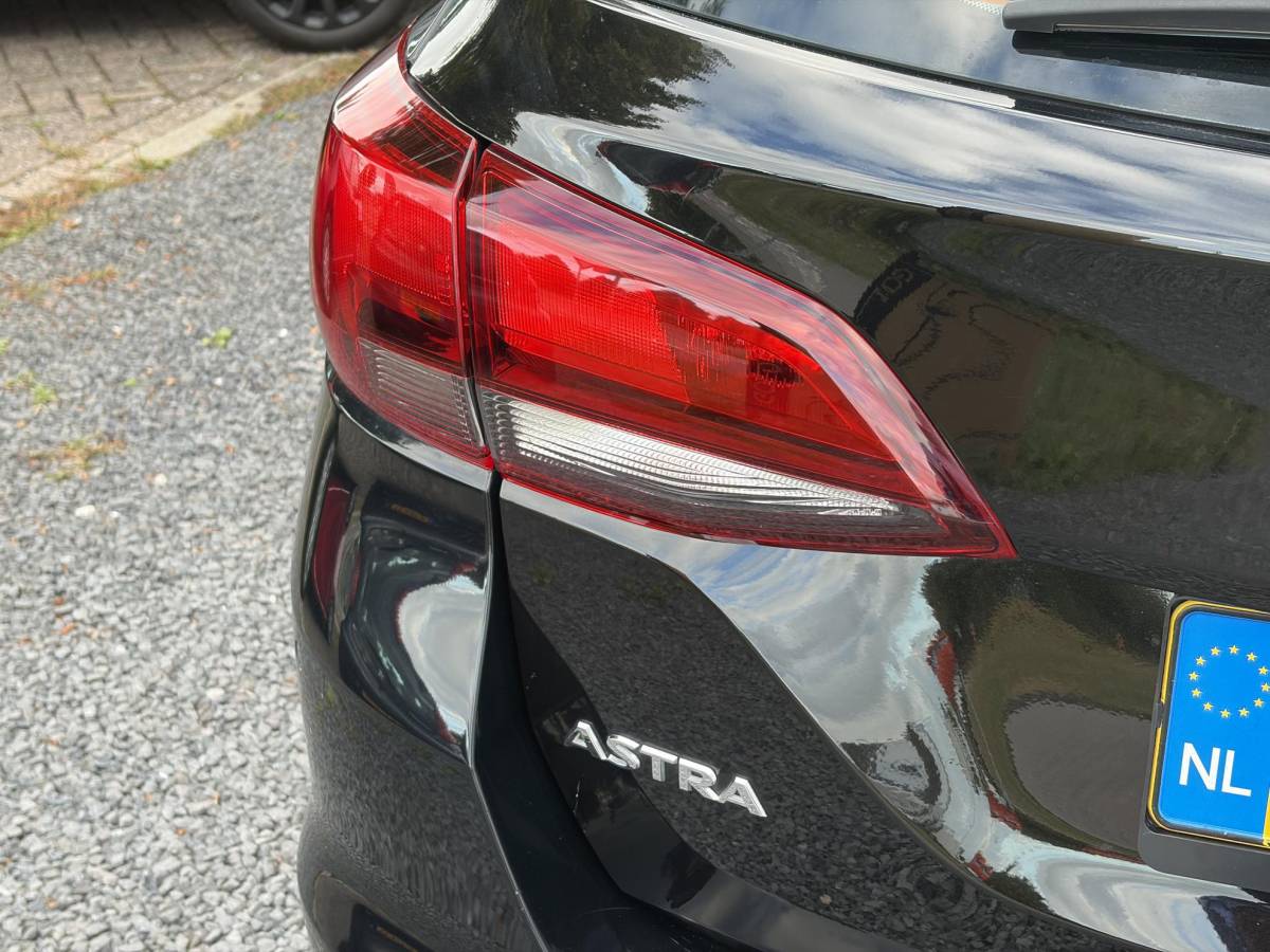 Opel Astra Opel Astra Sports Tourer 1.2 Edition ✓131pk✓2e Eigenaar✓Trekhaak✓Navi✓Airco✓Cruise✓Pdc V+A✓Lm velgen✓Dealer Onderhouden✓Comfortstoelen✓N.A.P✓Apk tot 07-2028