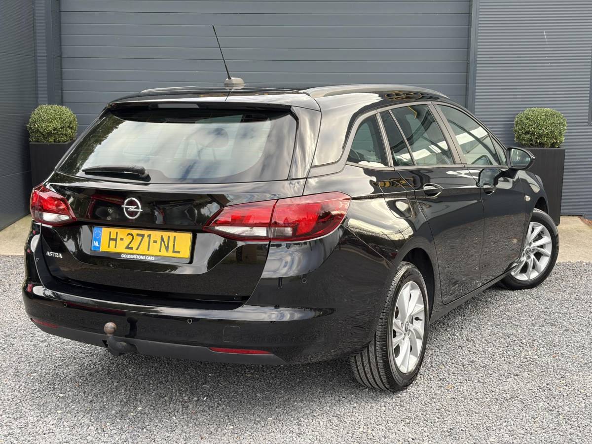 Opel Astra Opel Astra Sports Tourer 1.2 Edition ✓131pk✓2e Eigenaar✓Trekhaak✓Navi✓Airco✓Cruise✓Pdc V+A✓Lm velgen✓Dealer Onderhouden✓Comfortstoelen✓N.A.P✓Apk tot 07-2028