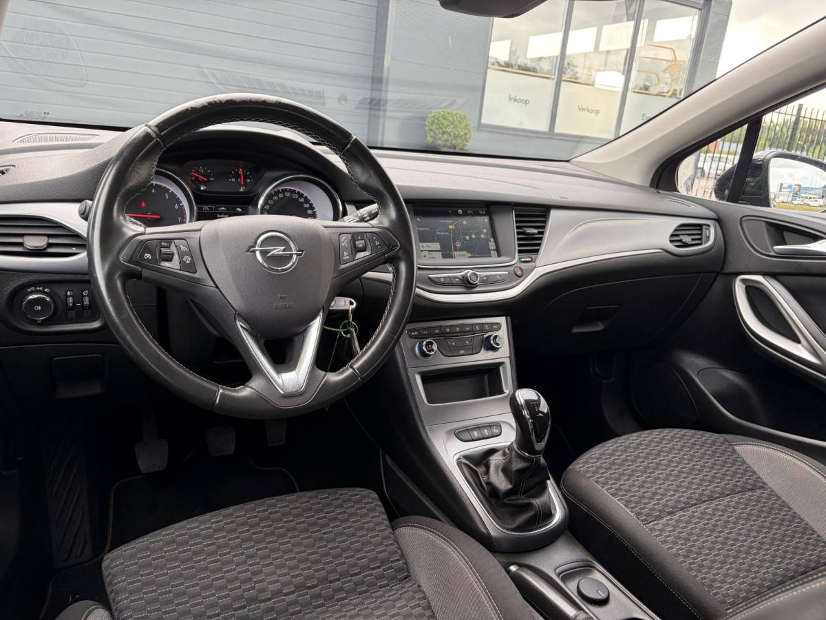Opel Astra Opel Astra Sports Tourer 1.2 Edition ✓131pk✓2e Eigenaar✓Trekhaak✓Navi✓Airco✓Cruise✓Pdc V+A✓Lm velgen✓Dealer Onderhouden✓Comfortstoelen✓N.A.P✓Apk tot 07-2028