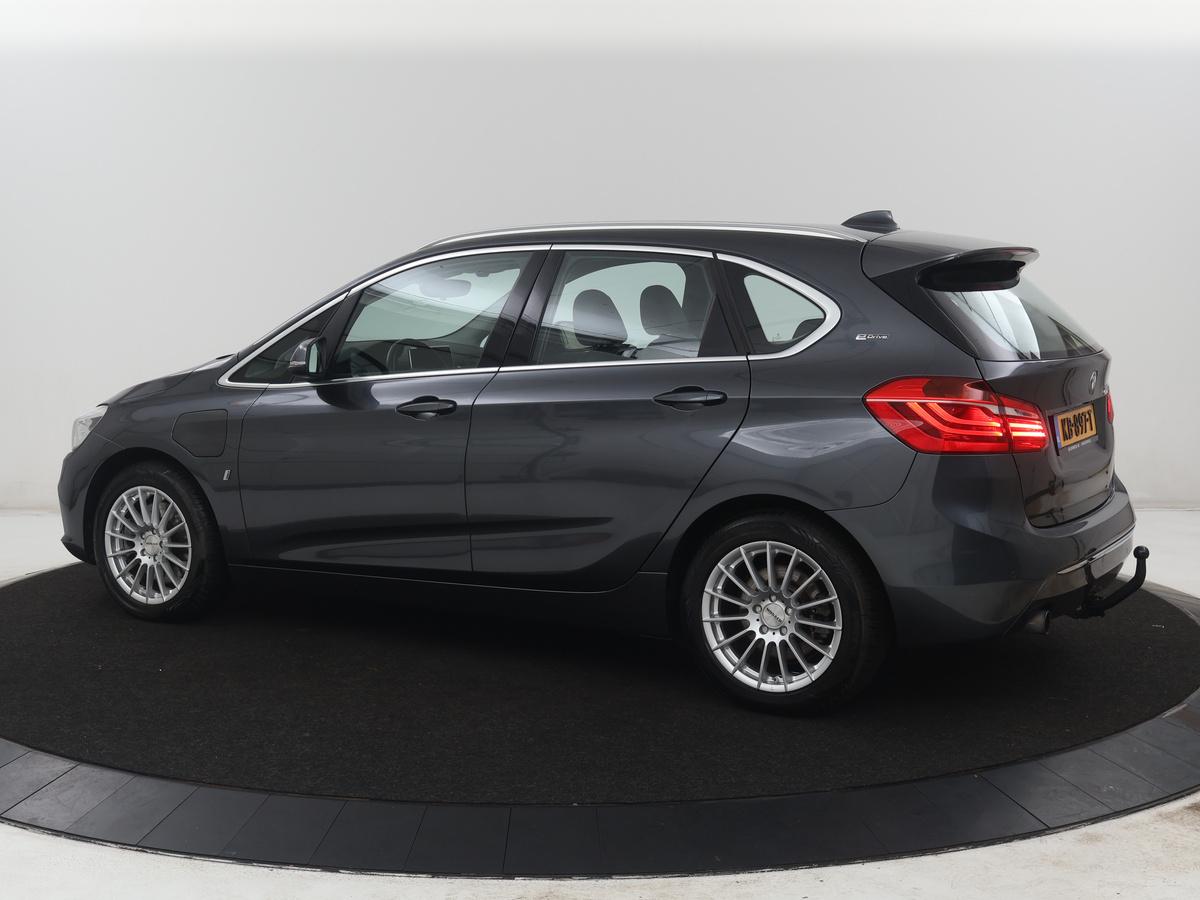 BMW 2 Serie BMW 2-serie Active Tourer 225xe iPerformance Centennial High Executive | SOH 88,6% | Leder | Stoelverwarming |  Adaptive cruise | Head-up | Navigatie | Bluetooth | Camera | Park assist | Elektrische achterklep | Trekhaak