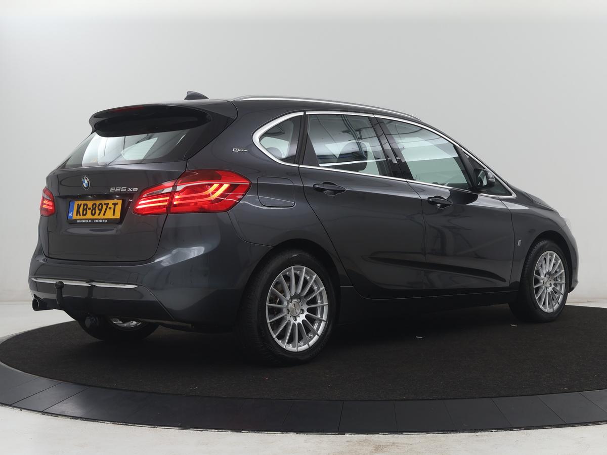 BMW 2 Serie BMW 2-serie Active Tourer 225xe iPerformance Centennial High Executive | SOH 88,6% | Leder | Stoelverwarming |  Adaptive cruise | Head-up | Navigatie | Bluetooth | Camera | Park assist | Elektrische achterklep | Trekhaak