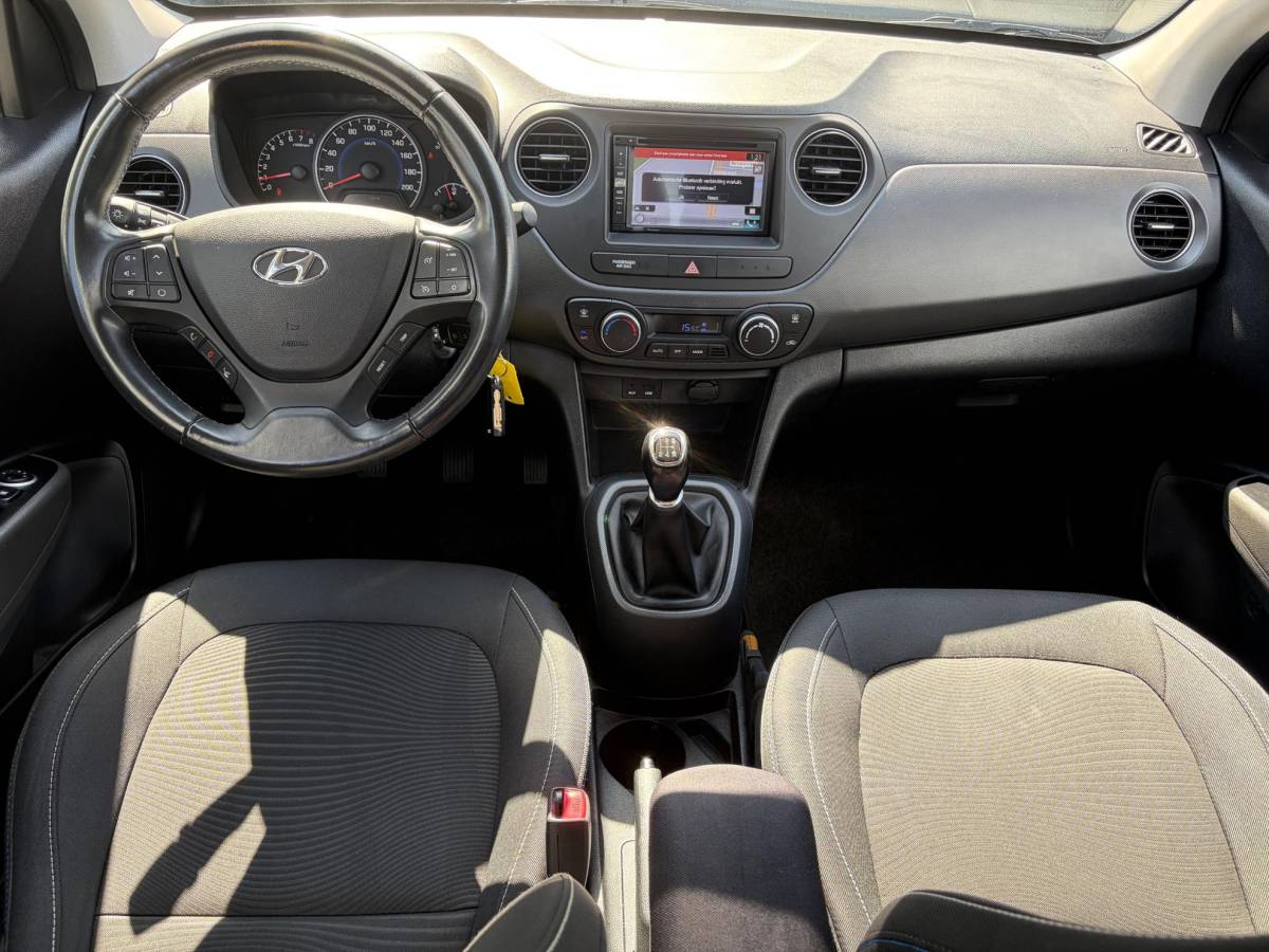 Hyundai i10 Hyundai i10 1.0i i-Motion Go! 2016 ✓Navi✓Clima✓Cruise✓Recent beurt gehad✓2eEigenaar✓5 Deurs✓N.A.P✓Weinig km✓Zeer Zuinig✓Apk tot 03-2027