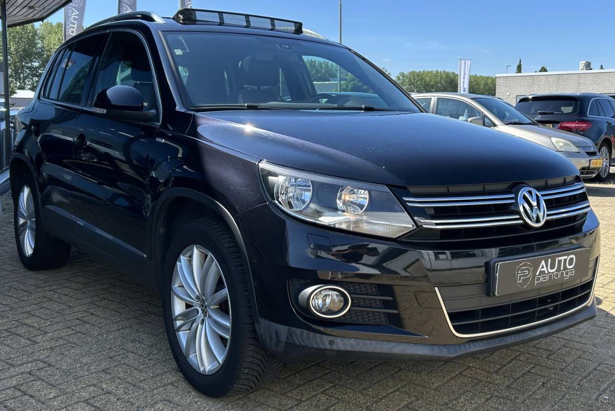 Volkswagen Tiguan Volkswagen Tiguan 2.0 TSI Sport&Style 4motion R-line Edition 179PK | Nette Staat! | AUTOMAAT | PANO | Trekhaak | Parkeersensoren Voor en Achter | Stoelverwarming | Climate Control | Cruise Control | DAB+ Pioneer |