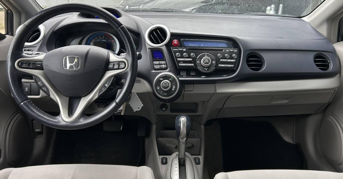 Honda Insight Honda Insight 1.3 Elegance 88PK | AUTOMAAT | Zeer Zuinige Hybride | Dealeronderhouden! | 2e Eigenaar | NL AUTO | NAP | Trekhaak | Stoelverwarming | Parkeersensoren | Climate Control | Cruise Control | 2 Sleutels |