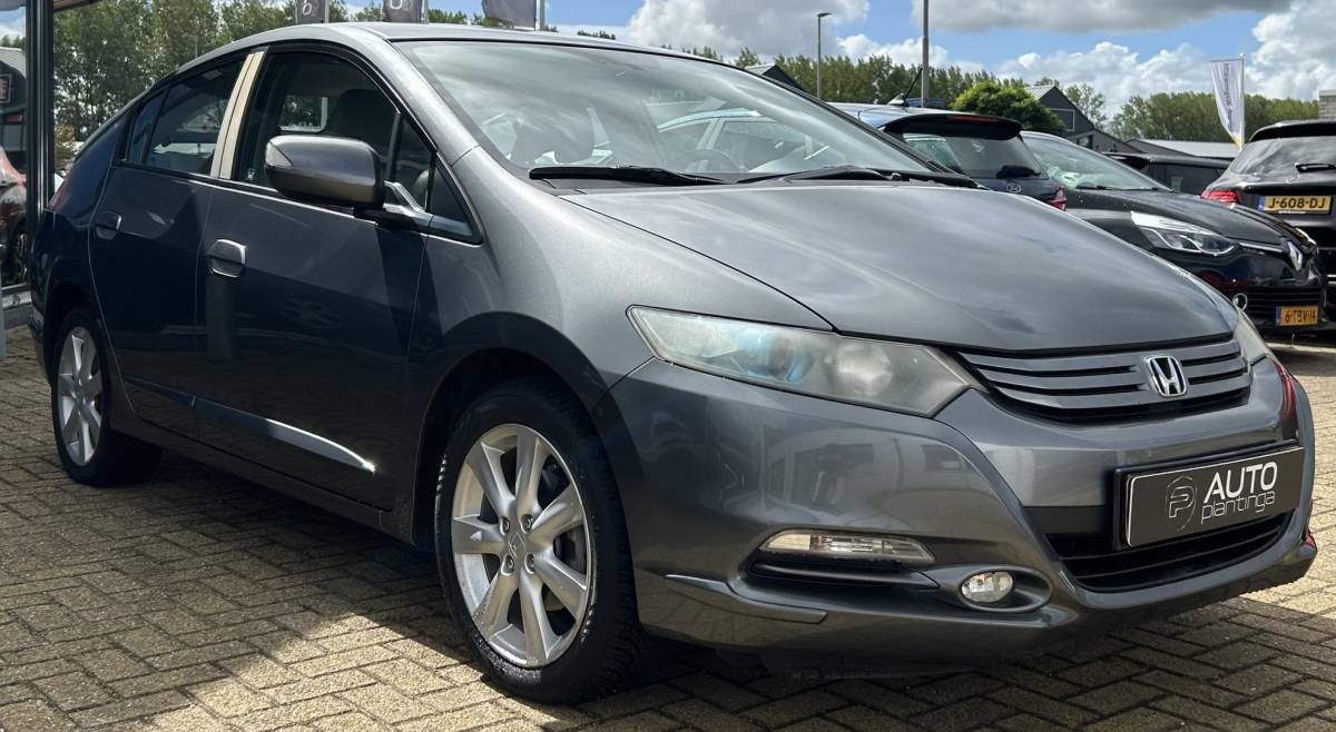 Honda Insight Honda Insight 1.3 Elegance 88PK | AUTOMAAT | Zeer Zuinige Hybride | Dealeronderhouden! | 2e Eigenaar | NL AUTO | NAP | Trekhaak | Stoelverwarming | Parkeersensoren | Climate Control | Cruise Control | 2 Sleutels |