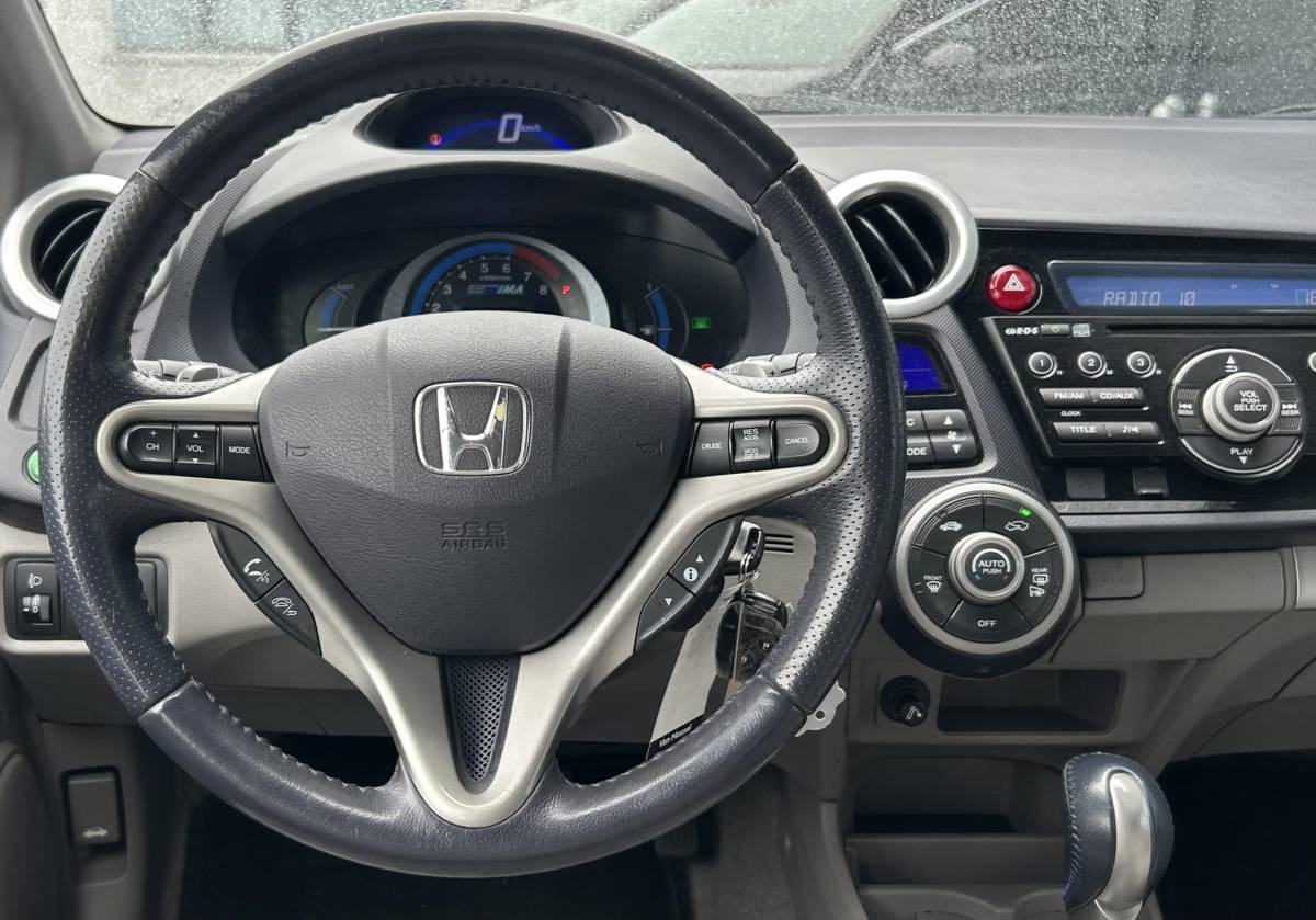 Honda Insight Honda Insight 1.3 Elegance 88PK | AUTOMAAT | Zeer Zuinige Hybride | Dealeronderhouden! | 2e Eigenaar | NL AUTO | NAP | Trekhaak | Stoelverwarming | Parkeersensoren | Climate Control | Cruise Control | 2 Sleutels |