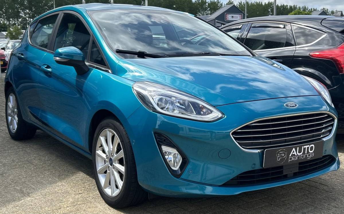 Ford Fiesta Ford Fiesta 1.0 EcoBoost Titanium 101PK | LUXE | Achteruitrijcamera | B&O Audio | Climate Control | Navigatie | Adaptive Cruise Control | Voorruitverwarming | Parkeersensoren Voor en Achter | Lichtmetalen Velgen | 2 Sleutels | DAB+ | NAP |