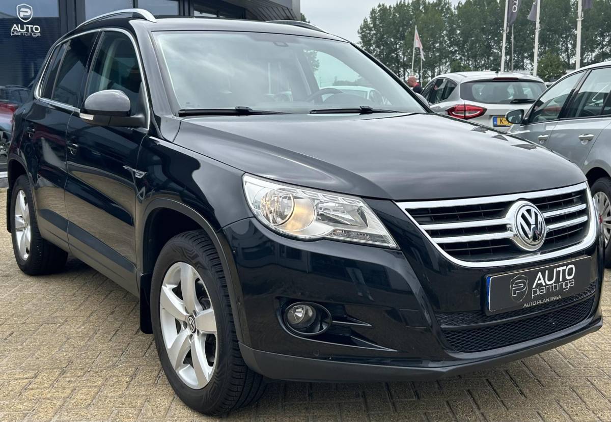 Volkswagen Tiguan Volkswagen Tiguan 1.4 TSI Sport&Style 4Motion 150PK | Nette Staat | Trekhaak | 2000KG Trekgewicht | NL AUTO |  NIEUWE APK | Achteruitrijcamera | Parkeersensoren Voor en Achter | Lederen Bekleding | Stoelverwarming | Climate Control | Cruise Control | 2 Sleutels |