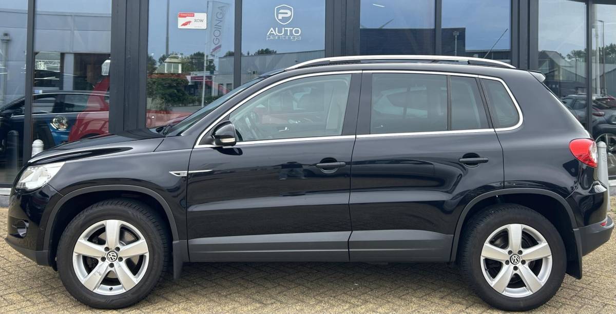 Volkswagen Tiguan Volkswagen Tiguan 1.4 TSI Sport&Style 4Motion 150PK | Nette Staat | Trekhaak | 2000KG Trekgewicht | NL AUTO |  NIEUWE APK | Achteruitrijcamera | Parkeersensoren Voor en Achter | Lederen Bekleding | Stoelverwarming | Climate Control | Cruise Control | 2 Sleutels |