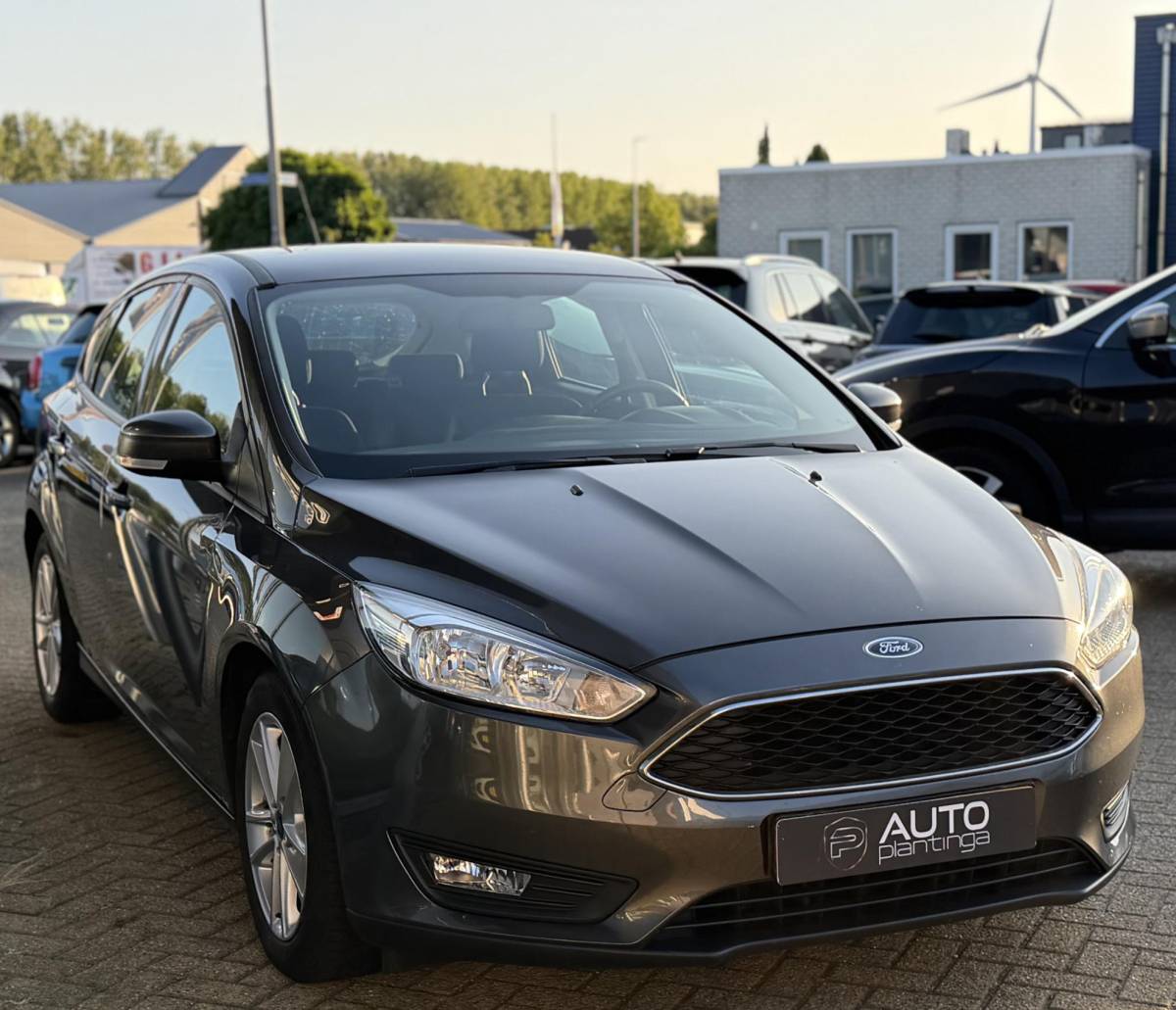 Ford Focus Ford Focus 1.0 Lease Edition 125PK | 2e Eigenaar | NL AUTO | NAP | Trekhaak | Navigatie | Airco | Cruise Control | Parkeersensoren | Lichtmetalen Velgen | APK tot 04-05-2027 |