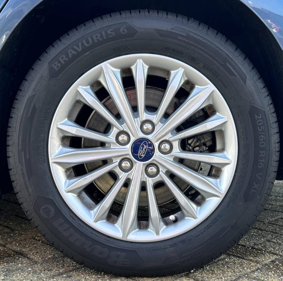 Ford Focus Ford Focus Wagon 1.0 EcoBoost Titanium Business 125PK | PANO | 2e Eigenaar | NL AUTO | Onderhoudshistorie | NAP | Elektrische Achterklep | Parkeersensoren | Winter Pack | Stoel Stuur en Voorruitverwarming | Climate Control | Cruise Control | Navigatie | Carplay | 2 Sleutels |
