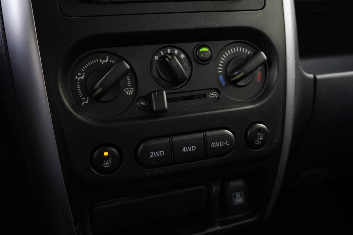 Suzuki Jimny Suzuki Jimny 1.3 Exclusive 4WD, Leer, Airco, Stoelverwarming