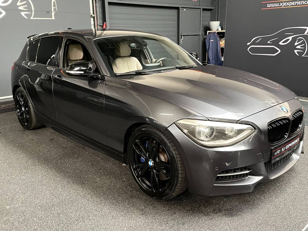 BMW 1 Serie BMW 1-serie M135i xDrive 320 PK M-PERFORMANCE NAVI LEER