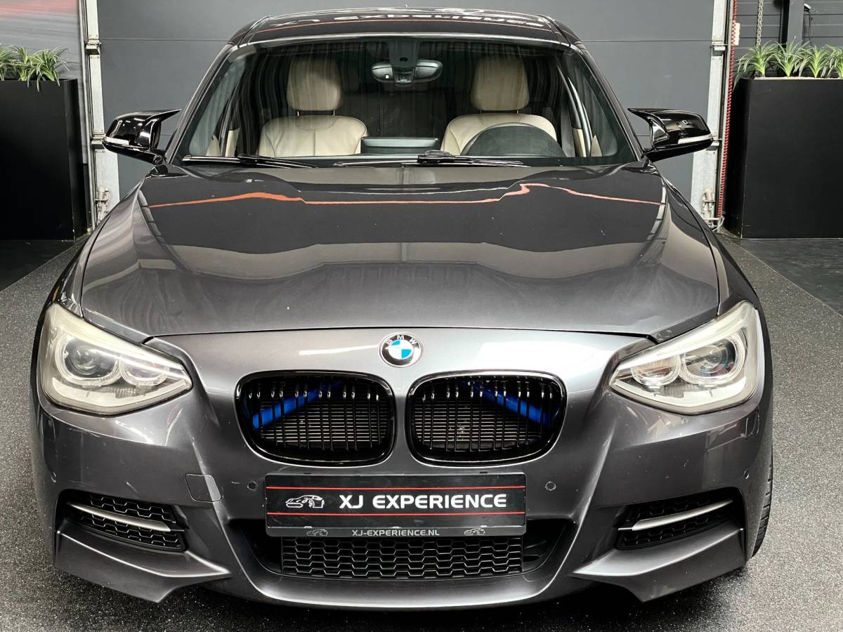 BMW 1 Serie BMW 1-serie M135i xDrive 320 PK M-PERFORMANCE NAVI LEER