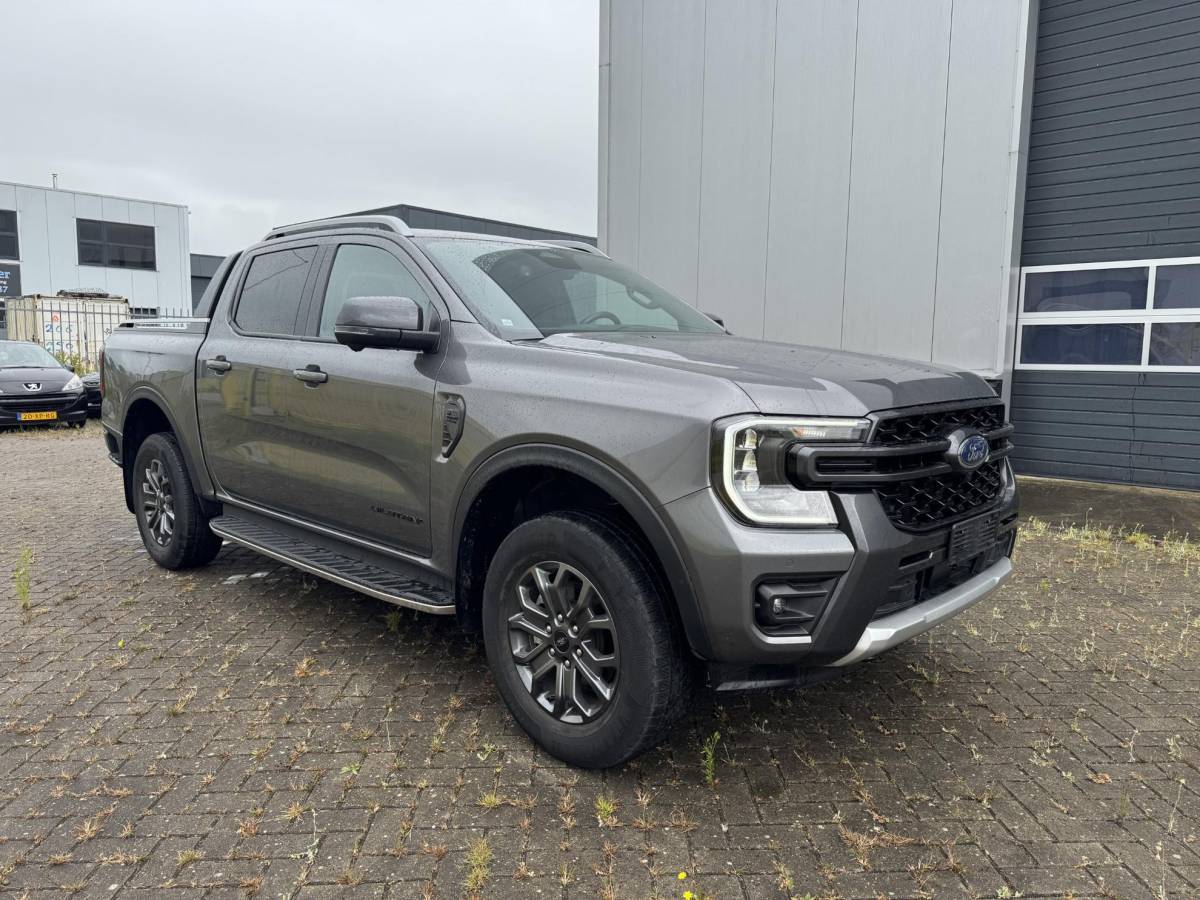 Ford Ranger Ford Ranger 2.0 Super Cab EcoBlue Wildtrak | SCI | Rollertop | Trekhaak | Adaptive Cruise Control | Camera | BELLEN VOOR BEZICHTIGING
