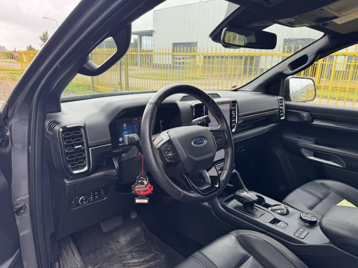 Ford Ranger Ford Ranger 2.0 Super Cab EcoBlue Wildtrak | SCI | Rollertop | Trekhaak | Adaptive Cruise Control | Camera | BELLEN VOOR BEZICHTIGING