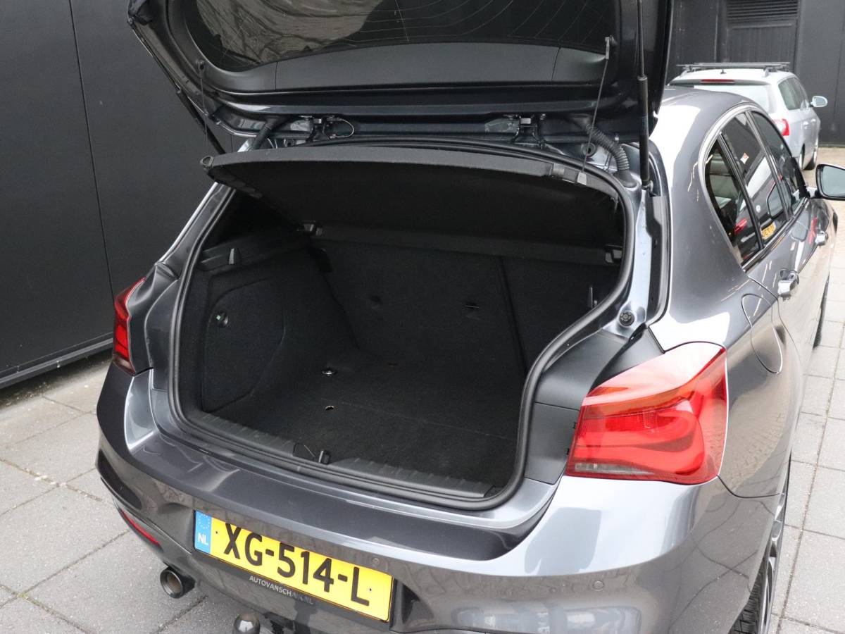 BMW 1 Serie BMW 1-serie 118i High Executive | AUT. | M SPORT | LEDER | SCHUIFDAK | TREKHAAK | PDC | STOELVERW. | CRUISE |