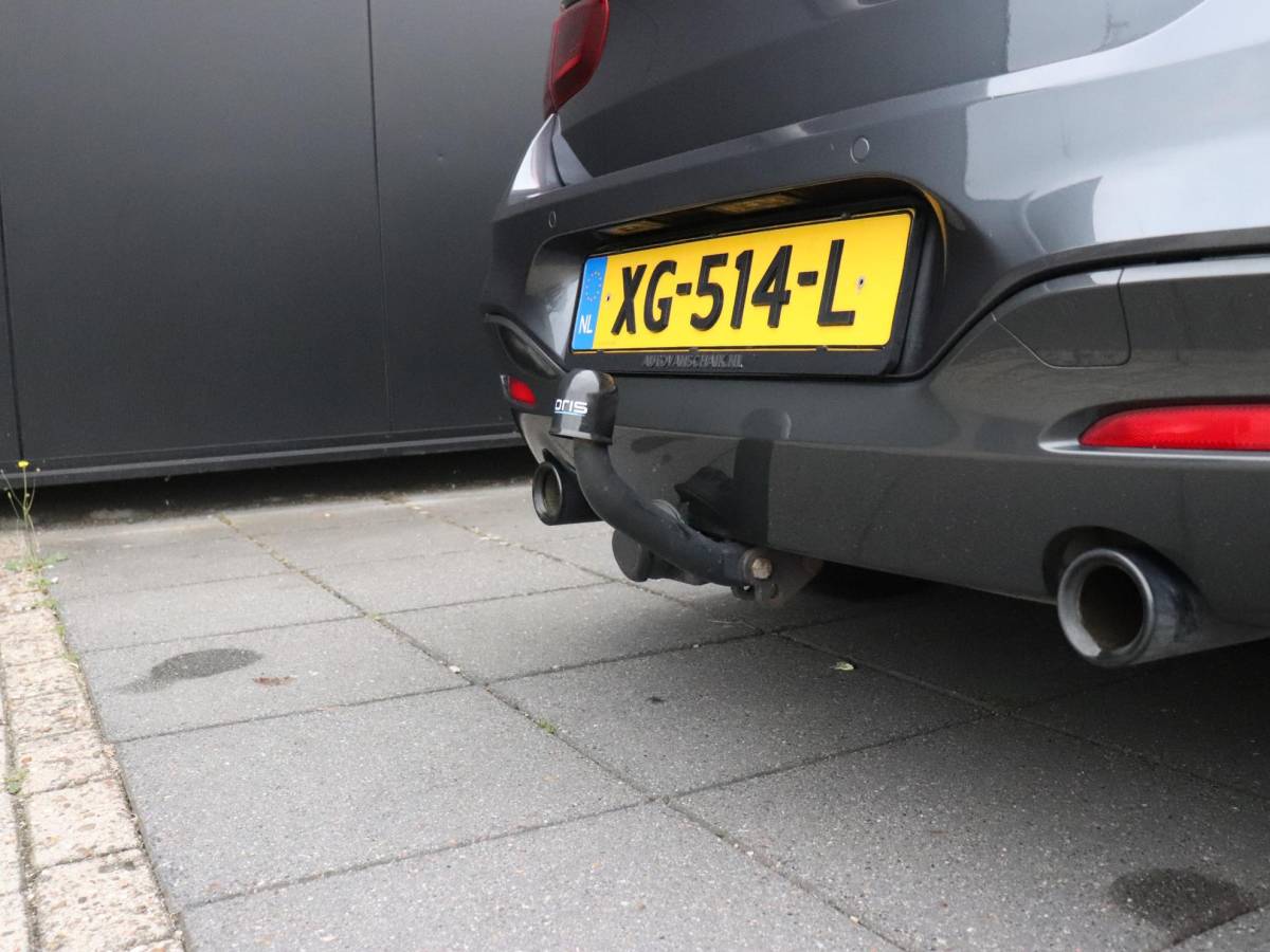 BMW 1 Serie BMW 1-serie 118i High Executive | AUT. | M SPORT | LEDER | SCHUIFDAK | TREKHAAK | PDC | STOELVERW. | CRUISE |