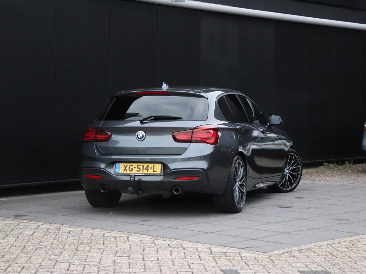 BMW 1 Serie BMW 1-serie 118i High Executive | AUT. | M SPORT | LEDER | SCHUIFDAK | TREKHAAK | PDC | STOELVERW. | CRUISE |