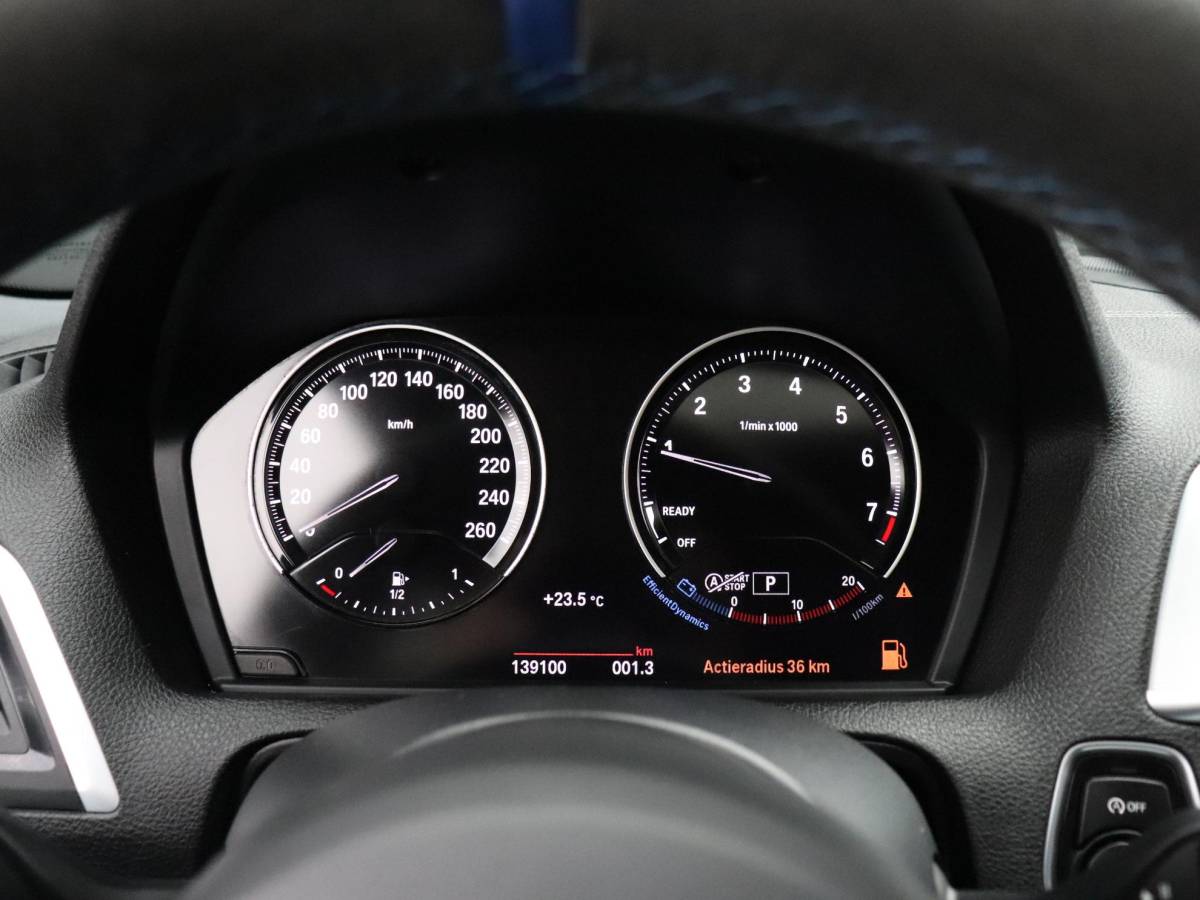 BMW 1 Serie BMW 1-serie 118i High Executive | AUT. | M SPORT | LEDER | SCHUIFDAK | TREKHAAK | PDC | STOELVERW. | CRUISE |