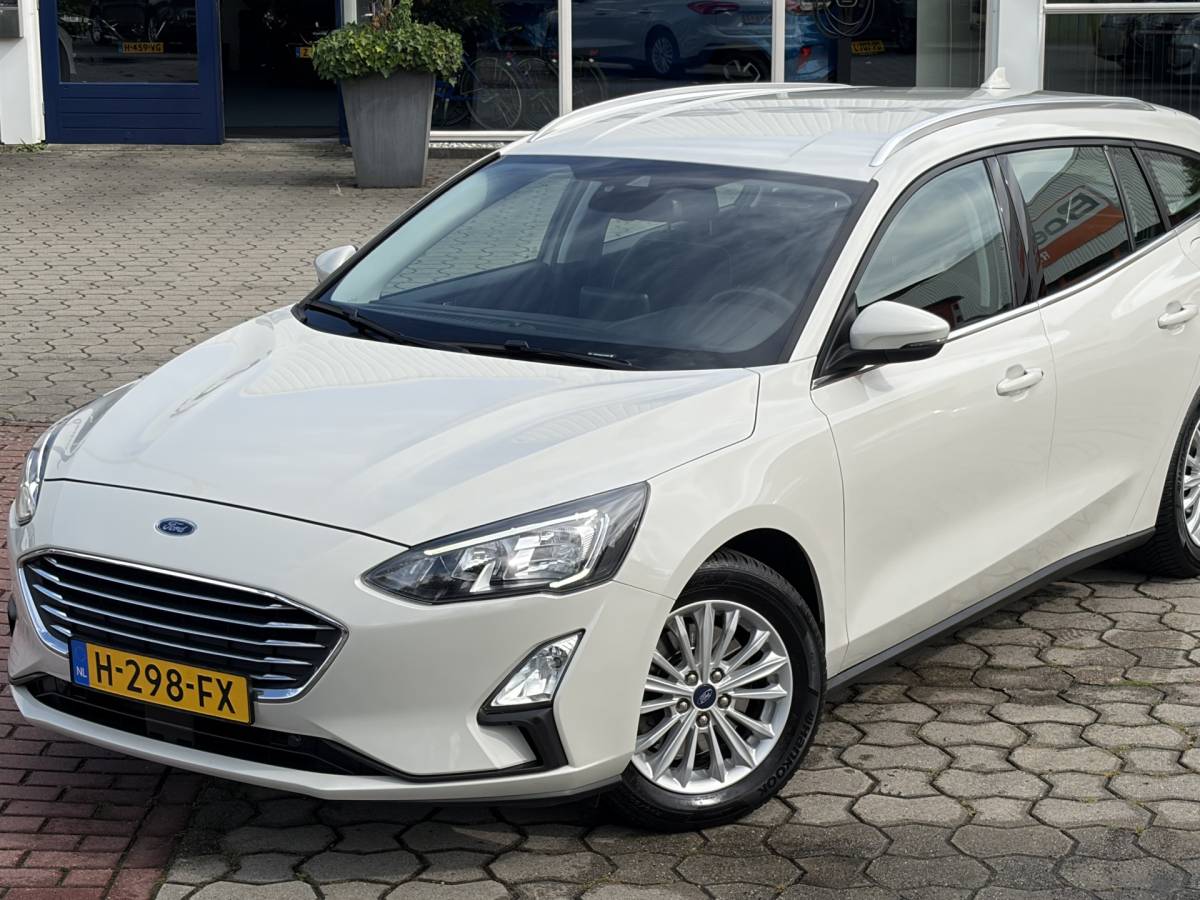 Ford Focus Ford Focus Wagon 1.0 EcoBoost Titanium Business | PDC | Navi | Trekhaak | Carplay | Rijklaar met beurt & garantie!