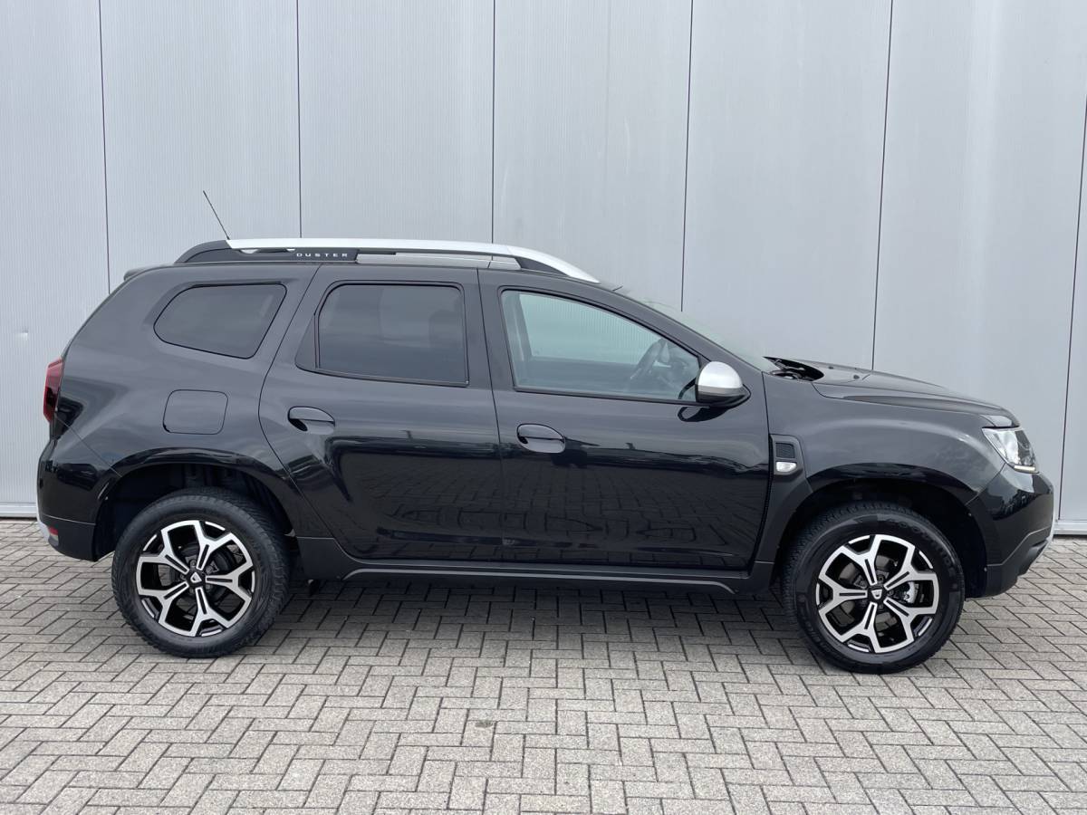 Dacia Duster Dacia Duster 1.3 TCe Prestige Navigatie, Airco, 17″Lm, Leder, Stoelverwarming, Trekhaak, Cruise Control, Achteruitrijcamera