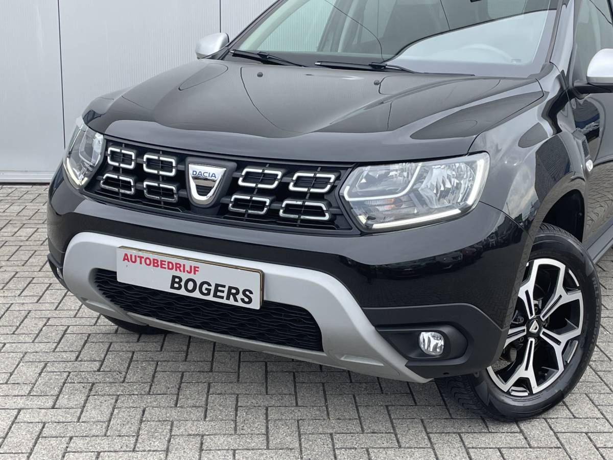 Dacia Duster Dacia Duster 1.3 TCe Prestige Navigatie, Airco, 17″Lm, Leder, Stoelverwarming, Trekhaak, Cruise Control, Achteruitrijcamera