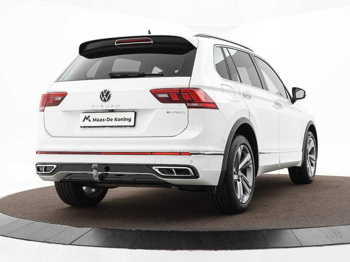 Volkswagen Tiguan Volkswagen Tiguan 1.4 TSI eHybrid 245pk DSG R-Line Business · Camera · Inklap. Trekhaak · Dodehoeksensor · Parkeer Assistent · Stuur- & Stoelverwarming · 19″Velgen ·
