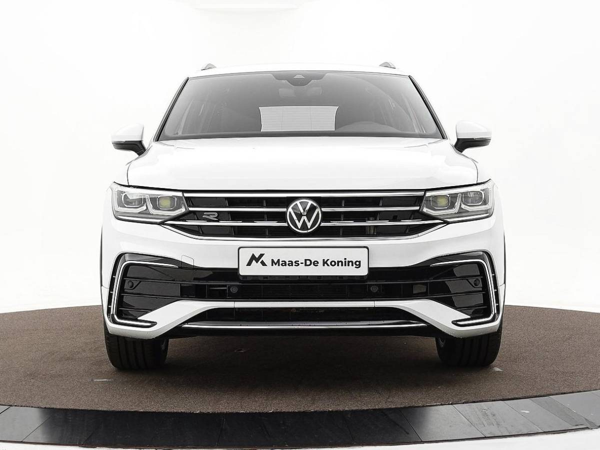 Volkswagen Tiguan Volkswagen Tiguan 1.4 TSI eHybrid 245pk DSG R-Line Business · Camera · Inklap. Trekhaak · Dodehoeksensor · Parkeer Assistent · Stuur- & Stoelverwarming · 19″Velgen ·