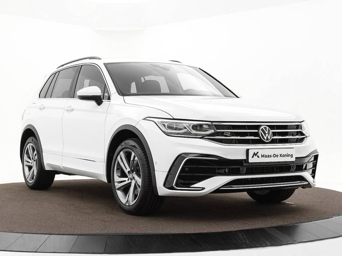 Volkswagen Tiguan Volkswagen Tiguan 1.4 TSI eHybrid 245pk DSG R-Line Business · Camera · Inklap. Trekhaak · Dodehoeksensor · Parkeer Assistent · Stuur- & Stoelverwarming · 19″Velgen ·