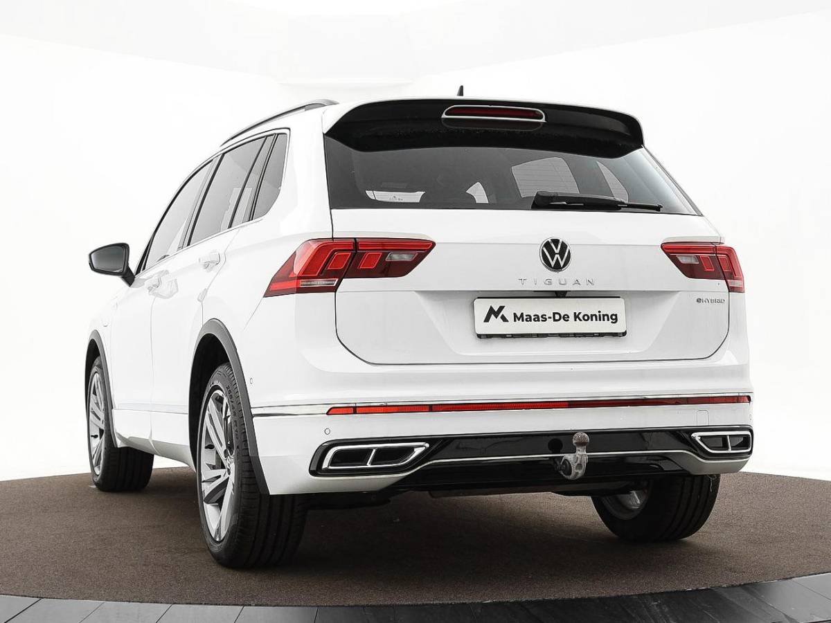 Volkswagen Tiguan Volkswagen Tiguan 1.4 TSI eHybrid 245pk DSG R-Line Business · Camera · Inklap. Trekhaak · Dodehoeksensor · Parkeer Assistent · Stuur- & Stoelverwarming · 19″Velgen ·