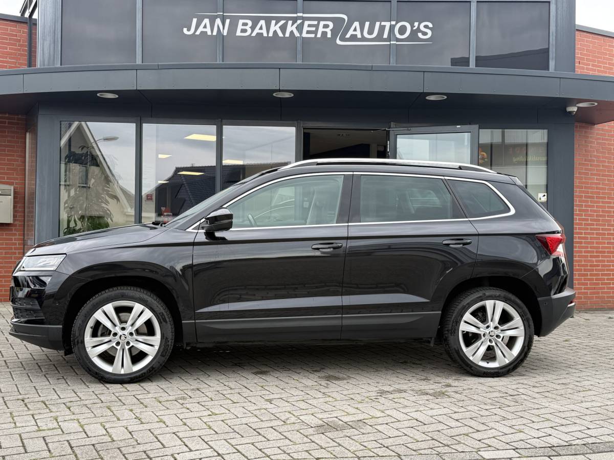 Škoda Karoq ŠKODA Karoq 1.5 TSI ACT Ambition Business ✅ CarPlay ✅ Elec.Trekhaak ✅ Climate  ✅ Stoelverwarming ✅