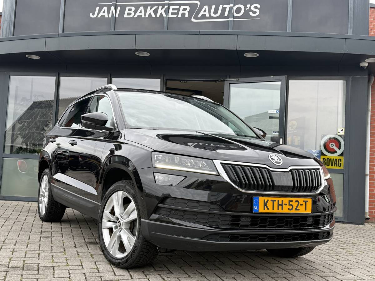 Škoda Karoq ŠKODA Karoq 1.5 TSI ACT Ambition Business ✅ CarPlay ✅ Elec.Trekhaak ✅ Climate  ✅ Stoelverwarming ✅