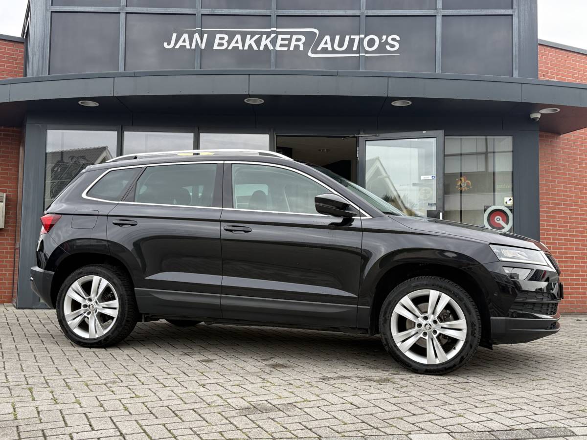 Škoda Karoq ŠKODA Karoq 1.5 TSI ACT Ambition Business ✅ CarPlay ✅ Elec.Trekhaak ✅ Climate  ✅ Stoelverwarming ✅