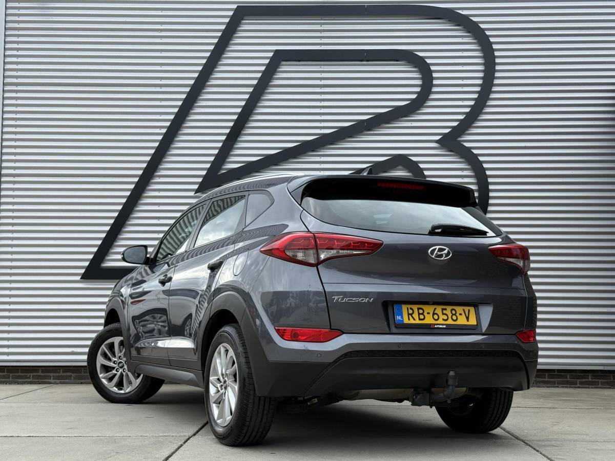 Hyundai Tucson Hyundai Tucson 1.6 GDi Comfort 1e Eigenaar|Navi|Camera|Clima|Stoelverwarming|Cruise|Trekhaak|Leder|6-bak|Nieuwe APK bij Aflevering