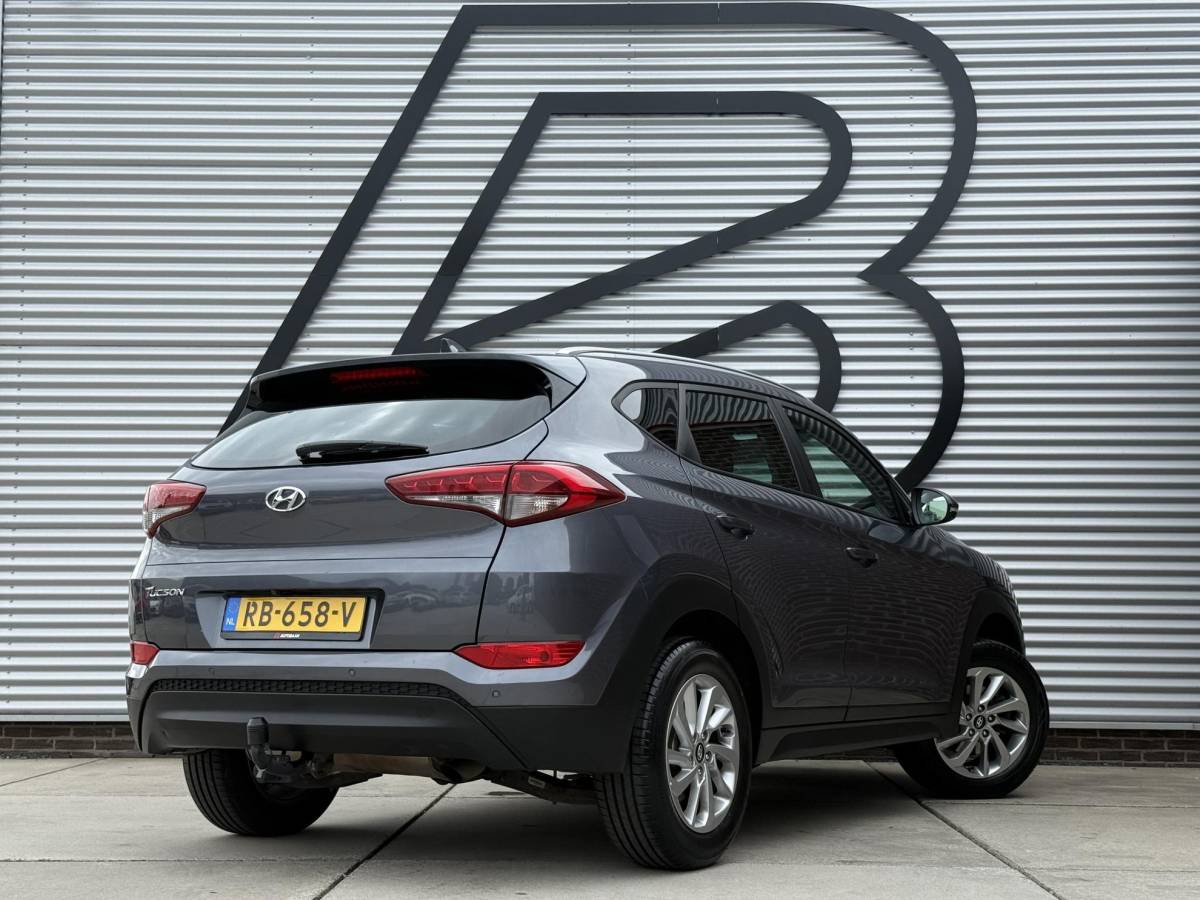 Hyundai Tucson Hyundai Tucson 1.6 GDi Comfort 1e Eigenaar|Navi|Camera|Clima|Stoelverwarming|Cruise|Trekhaak|Leder|6-bak|Nieuwe APK bij Aflevering
