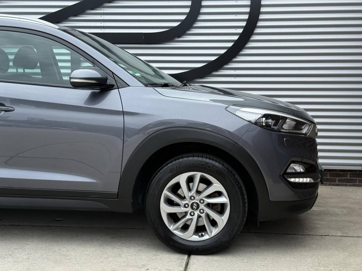 Hyundai Tucson Hyundai Tucson 1.6 GDi Comfort 1e Eigenaar|Navi|Camera|Clima|Stoelverwarming|Cruise|Trekhaak|Leder|6-bak|Nieuwe APK bij Aflevering