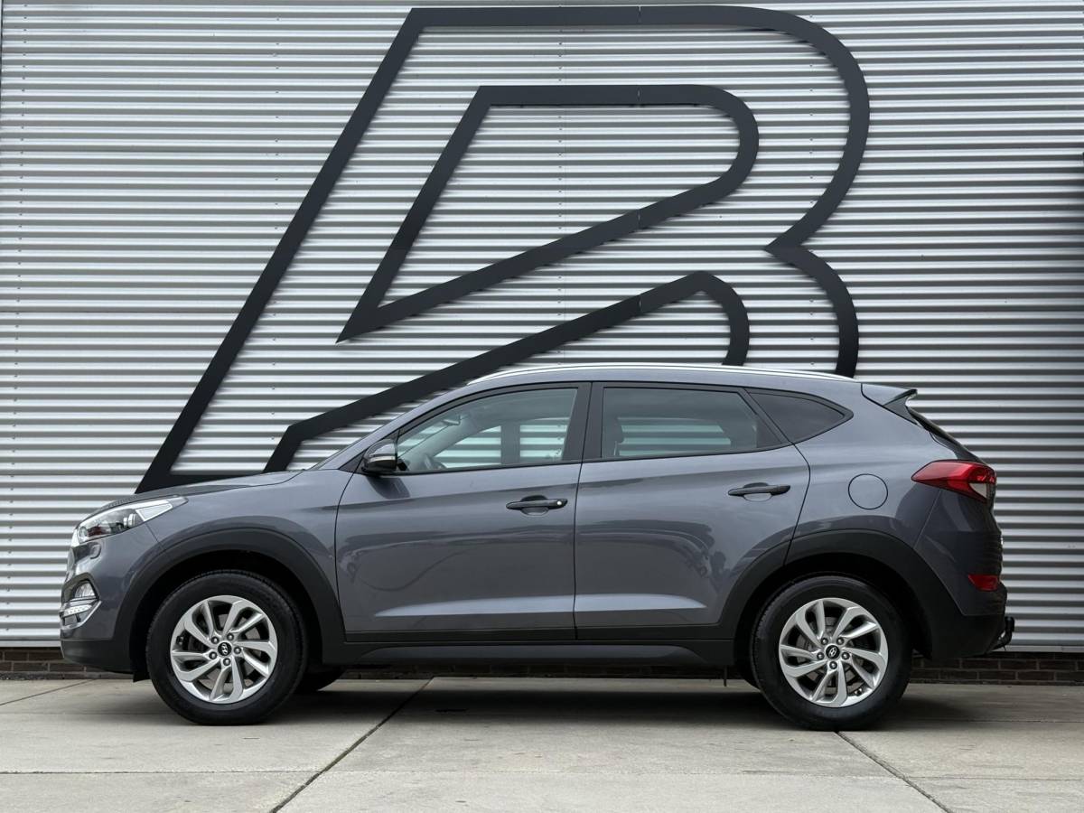 Hyundai Tucson Hyundai Tucson 1.6 GDi Comfort 1e Eigenaar|Navi|Camera|Clima|Stoelverwarming|Cruise|Trekhaak|Leder|6-bak|Nieuwe APK bij Aflevering