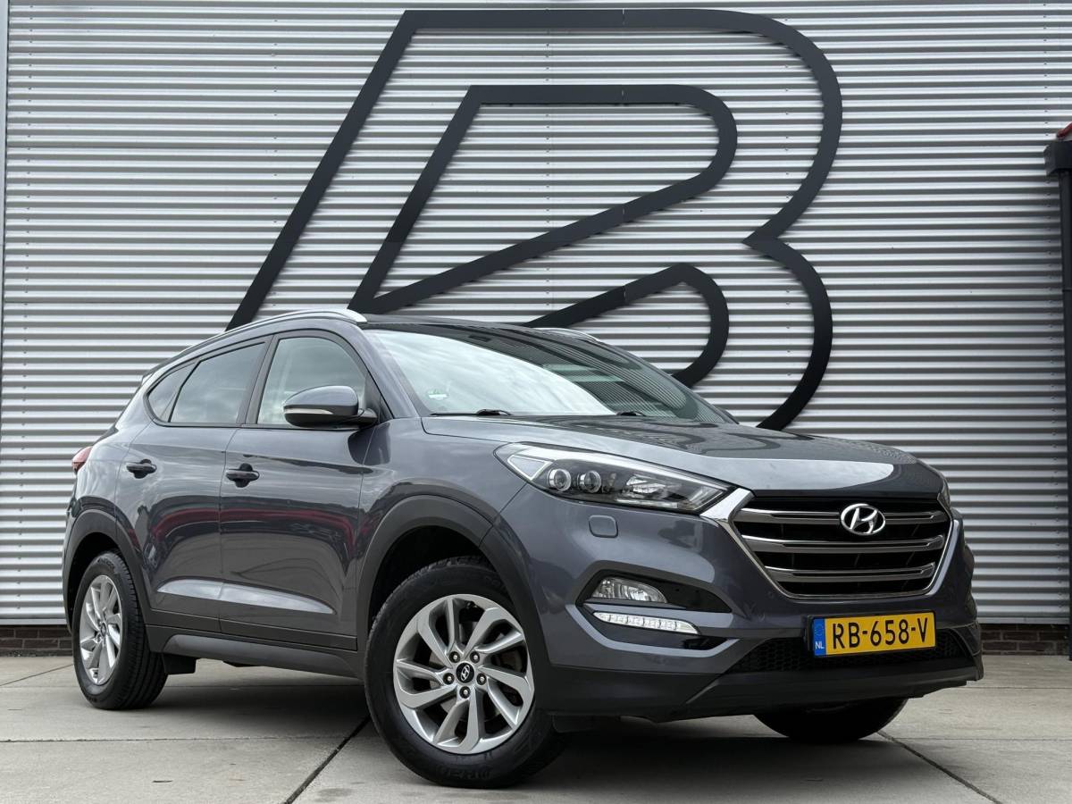 Hyundai Tucson Hyundai Tucson 1.6 GDi Comfort 1e Eigenaar|Navi|Camera|Clima|Stoelverwarming|Cruise|Trekhaak|Leder|6-bak|Nieuwe APK bij Aflevering