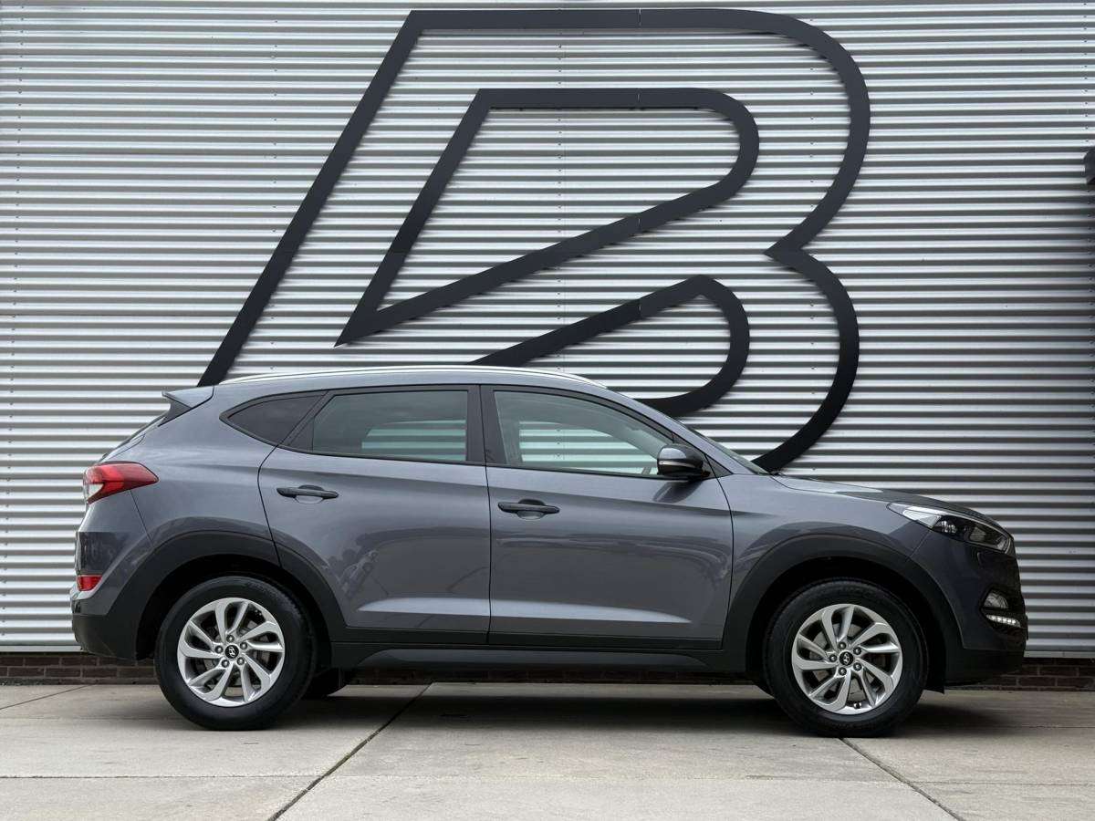 Hyundai Tucson Hyundai Tucson 1.6 GDi Comfort 1e Eigenaar|Navi|Camera|Clima|Stoelverwarming|Cruise|Trekhaak|Leder|6-bak|Nieuwe APK bij Aflevering