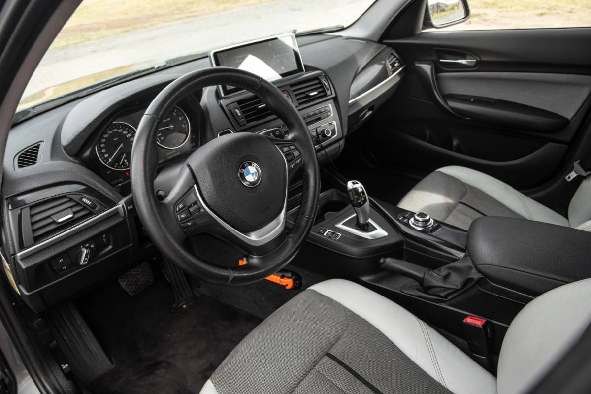 BMW 1 Serie BMW 1-serie 116i Business+ AUTOMAAT / CRUISE CONTROLE / BLACK LINE / AIRCO / CARPLAY / URBAN