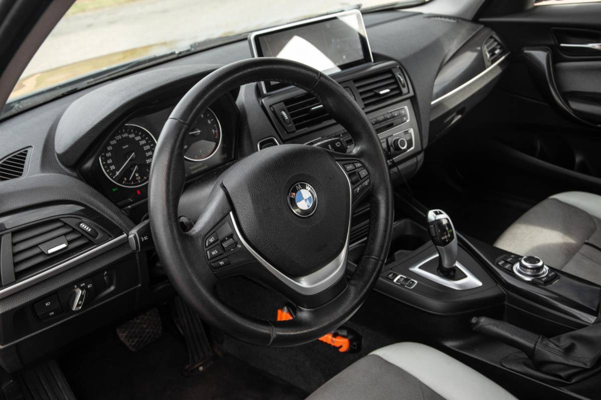 BMW 1 Serie BMW 1-serie 116i Business+ AUTOMAAT / CRUISE CONTROLE / BLACK LINE / AIRCO / CARPLAY / URBAN