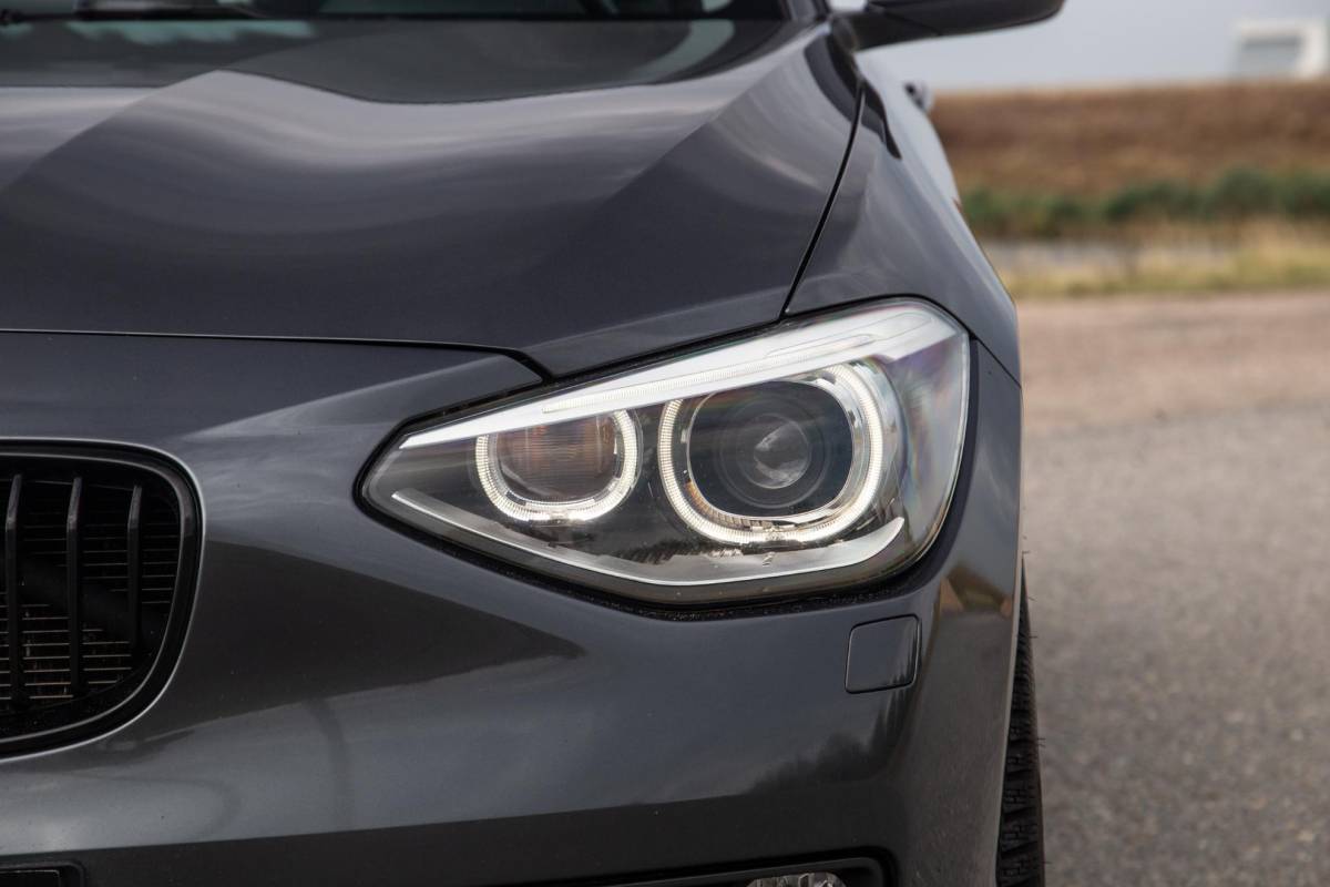BMW 1 Serie BMW 1-serie 116i Business+ AUTOMAAT / CRUISE CONTROLE / BLACK LINE / AIRCO / CARPLAY / URBAN