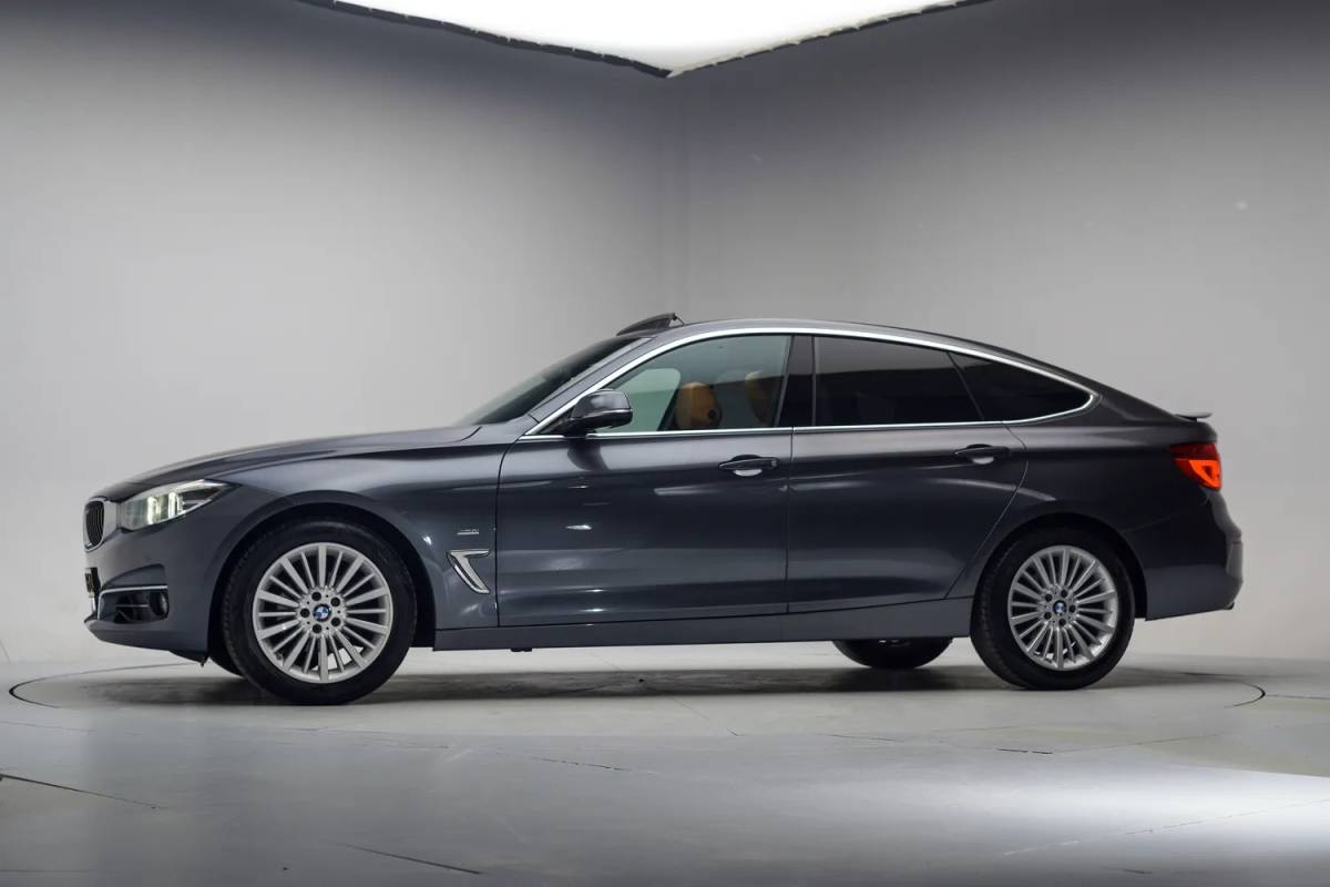 BMW 3 Serie BMW 3-serie GT 320i High Executive Aut. [ Panorama Adapt.cruise Leder Head-up ]