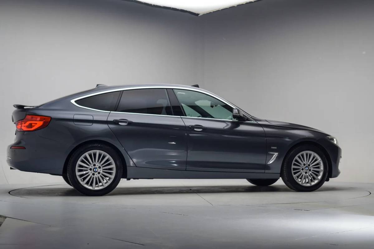 BMW 3 Serie BMW 3-serie GT 320i High Executive Aut. [ Panorama Adapt.cruise Leder Head-up ]