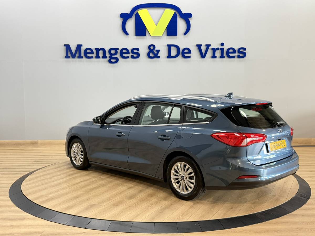 Ford Focus Ford Focus Wagon 1.0 EcoBoost Titanium Business Airco ECC | StuurStoel Verwarming | Camera | Keyless | Adaptive Cruise | Isofix | NAP