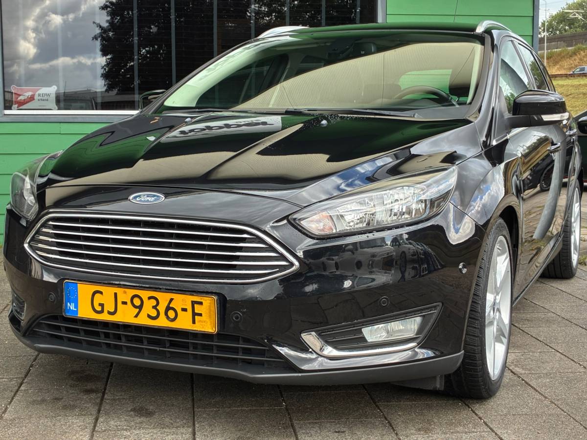 Ford Focus Ford Focus Wagon 1.0 Titanium Edition|1e Eigenaar|D-riem v.v.|Navigatie|Cruise|Climatronic|Trekhaak|PDC|Nieuwe APk|NAP|